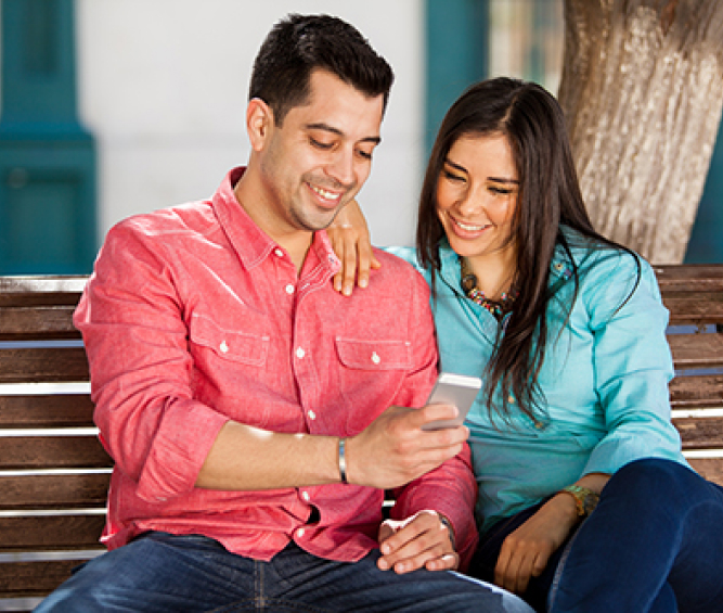 couple sitting on bench